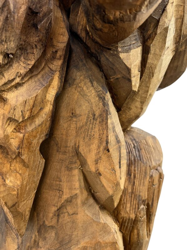 Sculpture en bois des 3 hommes