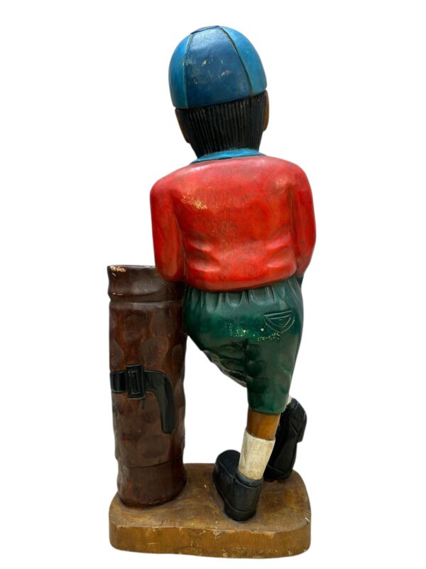 Golfeur en bois sculpté