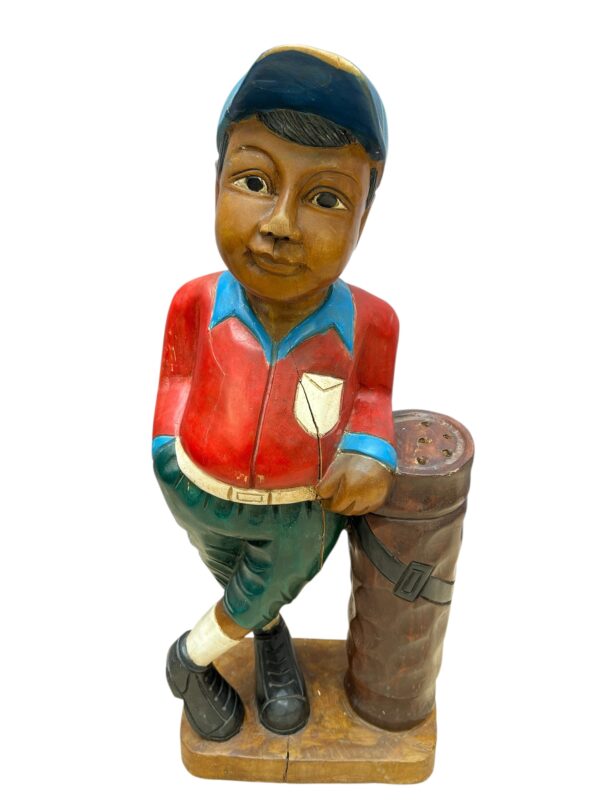 Golfeur en bois sculpté