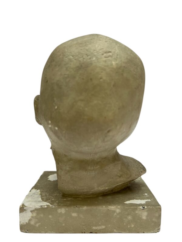 Paire de visages en plâtre, objet de curiosité