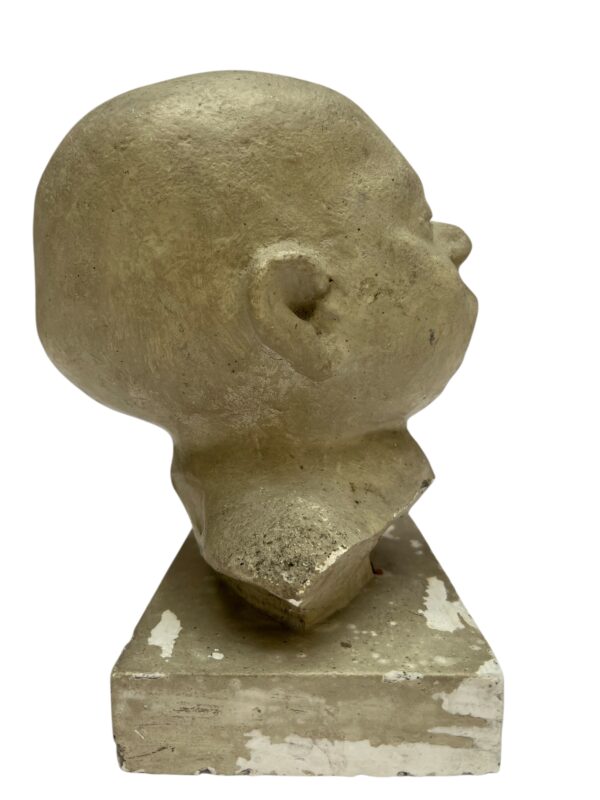 Paire de visages en plâtre, objet de curiosité